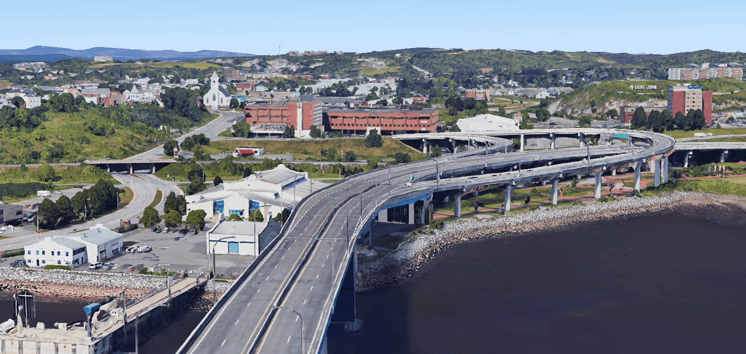 Regional aerial context — Saint John harbour, bridge, and Uptown from Place 400
